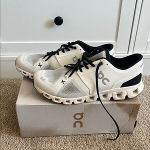 On Running White and Black Performance Sneakers